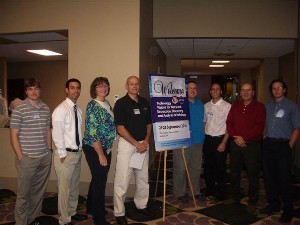 NEDA 2011 committee members joining together in September are (l-r) Ryan May, Peter Lamonica, Nan Pfrimmer, Craig Anken (committee chairman), Mike Bilinski, John Spina, Raymond Liuzzi and Mark Zappavigna.